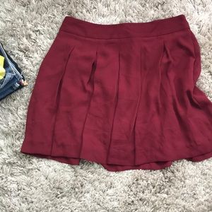Burgundy pleated mini skirt